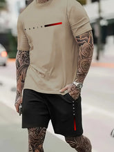 Model in khaki Parivor FutureFlex Set relaxing at home, showcasing full front view and Paris logo.
