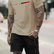 Zoomed-in front view of khaki Parivor FutureFlex Set while crossing street, focus on Paris logo and fabric texture.