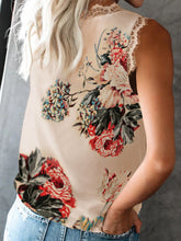 Back view of Model walking along a path wearing floral Lace Detail Tank in pastel yellow