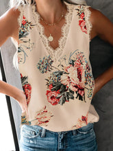 Model pairing Lace Detail Tank in pastel yellow with light wash jeans