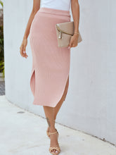 Side view of pink Zynoria Ribbed Side Slit Midi Skirt showcasing side slit detail
