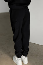 back view of pockease active joggers in black showing tapered leg