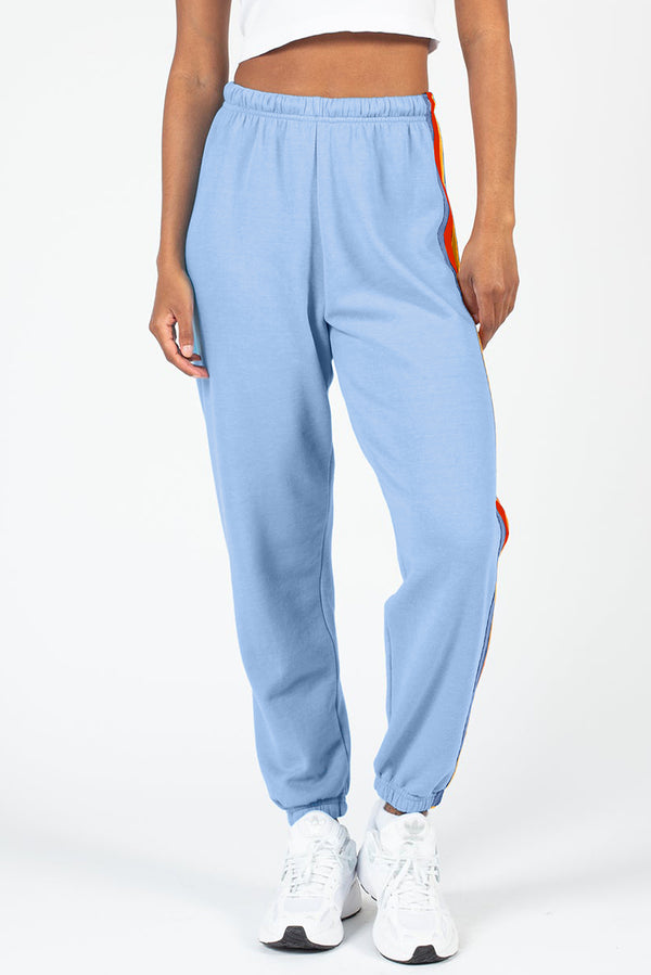 PrismFlow Active Pants light blue front view styled with white top and sneakers