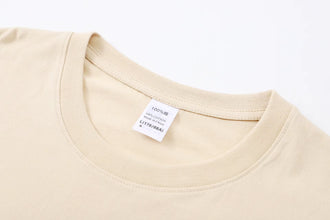 Close-up of khaki PureForm Luxe Cotton Tee round neck showing smooth ribbed collar and neat stitching