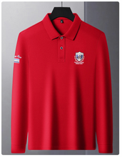 Front view of red Equestrian Crest Designer Polo on hanger.