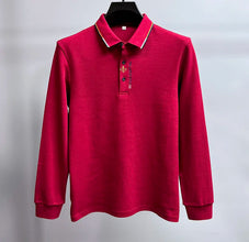 Front view of Royale Crest Fleur de Lis Polo in Red.