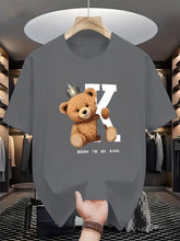 Regal K Bear Dark Gray Graphic Tee on hanger in luxury closet.
