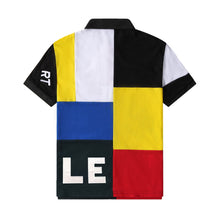 Back view of RegaliaSport Elite Multi-Color Embroidered Polo in Black showing color-block design, black collar, and multicolor placket.