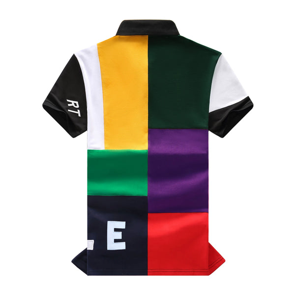 Back view of RegaliaSport Elite Multi-Color Embroidered Polo in Green showing color-block design, black collar, and multicolor placket.