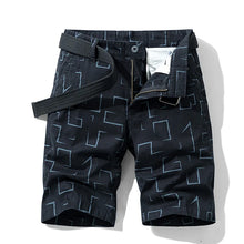 Black abstract print men’s safari Bermuda shorts front view.