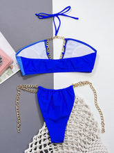 Royal blue chain detail halter neck bikini set back flat lay view