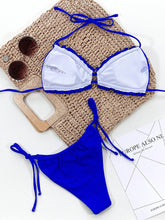 Royal blue frill trim halter neck bikini set back flat lay view