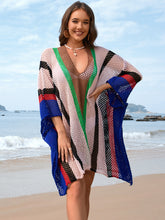 Close-up front view of royal blue openwork color block plunge cover-up showing deep V neckline and texture detail