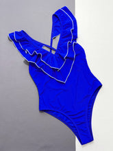 Royal blue ruffled crisscross backless one-piece swimsuit front flat lay view