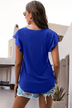 royal blue ruffled round neck cap sleeve blouse back view