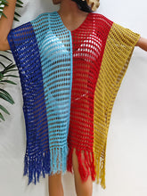 Royal blue Close-up styled view of Velorisse color block fringe cover-up highlighting fringe detail