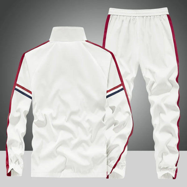 Back view of the White RoyaleFlux Crownstripe 2 Piece Tracksuit by NyxeAura Royale, showing clean back panel, contrast side stripes, and elastic-waist joggers with tailored cuffs.