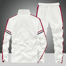 Back view of the White RoyaleFlux Crownstripe 2 Piece Tracksuit by NyxeAura Royale, showing clean back panel, contrast side stripes, and elastic-waist joggers with tailored cuffs.