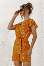 Ruffled Polka Dot Half Button Romper - Side View, Mustard, Ruffle Detail, Flowy Silhouette.