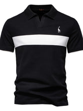 Front view of black contrast polo with giraffe embroidery and v-neck collar