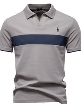 Front view of gray contrast polo with giraffe embroidery and v-neck collar
