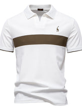 Front view of white contrast polo with giraffe embroidery and v-neck collar