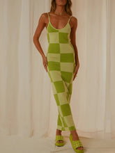 Front view of Sage Luxnometry Maxi Sweater Dress modeled in a bright, luxurious mansion hallway.