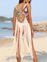 Model back angle on the beach wearing a Sand fringe spaghetti strap cover-up dress 