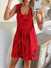 Scarlet Kélure overalls styled for a casual date night with heeled sandals and layered necklaces.