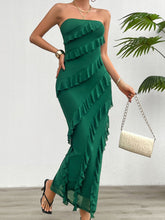 Model wearing the Seraflore™ Maxi Dress in Dark Green, featuring a strapless neckline and soft ruffle detailing.