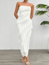 Model wearing the Seraflore™ Maxi Dress in White, featuring a strapless bodice and soft cascading ruffle trim.