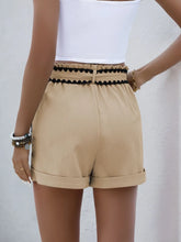Back view of Seravelya Wave Shorts tan with frill waistband and hem cuffs