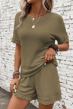 Side angle of army green Shakaluxe tassel shorts set.