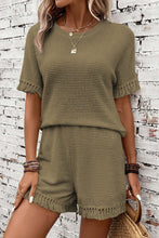Army green Shakaluxe styled for travel and casual chic.
