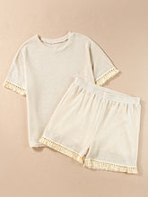 Shakaluxe waffle knit tassel set in cream, flatlay front view.