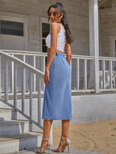 Sky Blue Denivéra Button Skirt back view near balcony