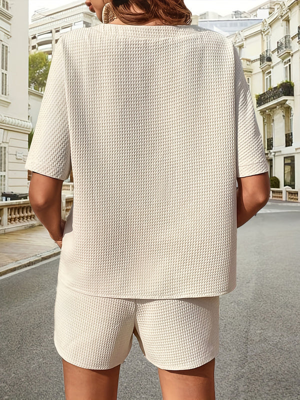 Model  back view showcasing the back of a beige Soft But Savage Waffle-Knit Shorts Set styled with  gold hoops and sandals at brunch.