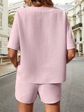 Back view of Soft But Savage Waffle-Knit Set in lavender, highlighting relaxed silhouette and textured fabric.