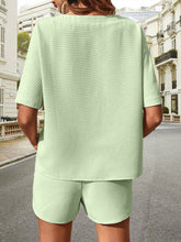 Back view of Soft But Savage Waffle-Knit Set in light green, highlighting relaxed silhouette and textured fabric.