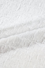Close-up view of premium polyester textured fabric.