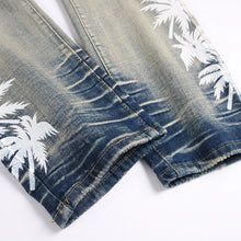 Close-up of hem stitch on SOKOTOO Men Coconut Palm Print Denim Jeans
