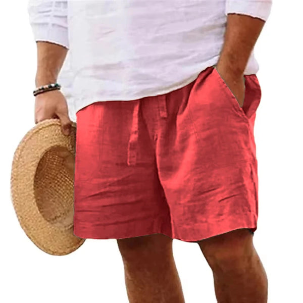 Solivaro men's red cotton relax fit adjustable waist shorts styled with straw hat, front view.
