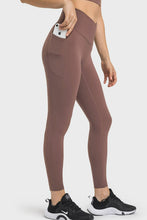 side view phone in pocket on solunexa fit leggings brown