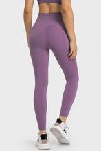 back view of solunexa fit leggings purple