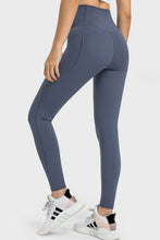 back view of solunexa fit leggings steel