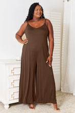 Warm and earthy Mocha Solvara Balance Jumpsuit with a soft rayon texture and sleek spaghetti straps.
