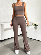 Taupe Solvenza MoveEase Lounge Set styled for workout, paired with trainers and hair up.