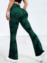 back angle aerobic movement in spectraflow bootcut leggings black forest