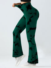 side view yoga asana in spectraflow bootcut leggings black forest highlighting four-way stretch fabric