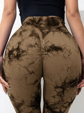 close up back view of spectraflow bootcut leggings coffee brown highlighting fabric texture